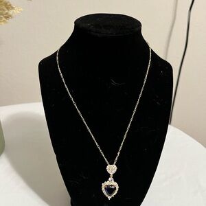 Elegant Gold and Blue Heart Pendant Necklace


it is plated in gold